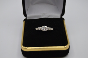 14kt White Gold Diamond Ring.  Over .75 Carats total.  Beautiful ring $1999.00!