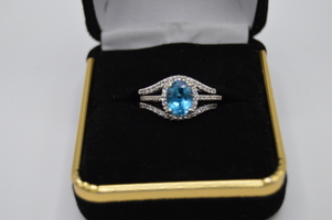 14kt White Gold Blue Topaz Stone with diamonds and 2 matching Diamond bands!!