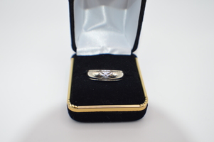  14kt White Gold Band with a Small Diamond.  Only $445.00